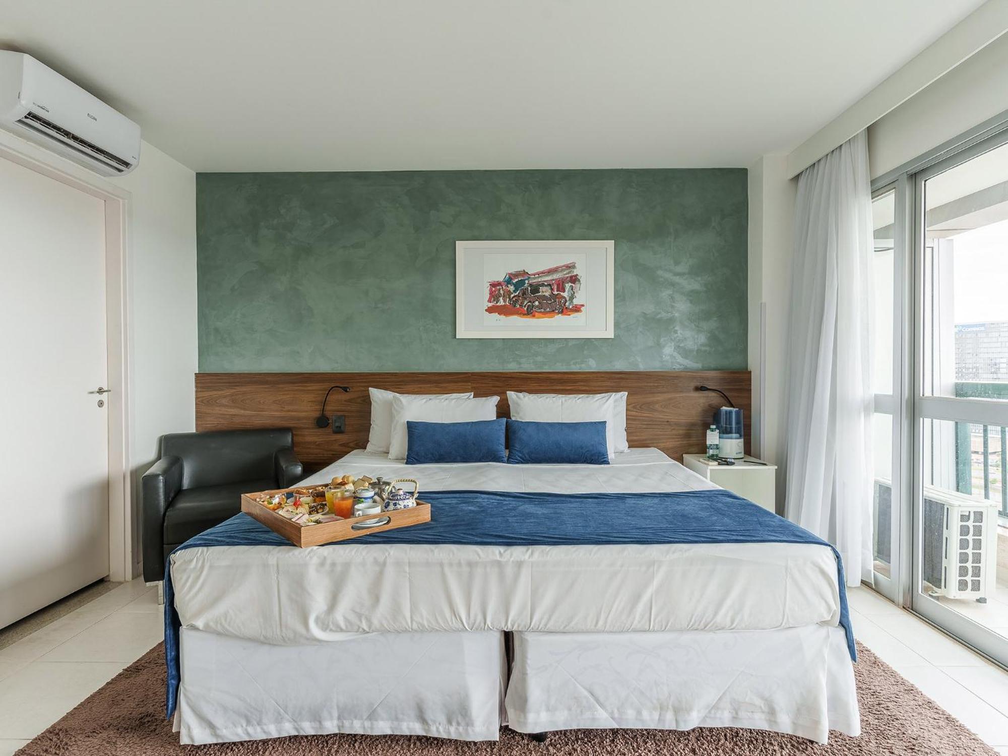 Quarto Deluxe (2 Adultos + 1 Criança)