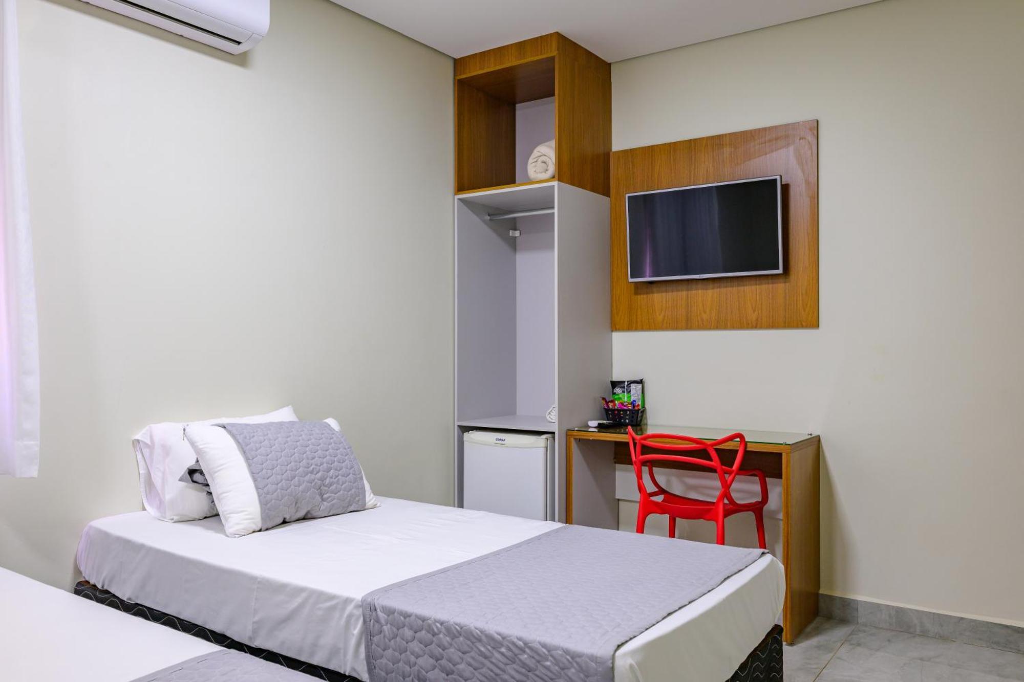 Quarto Quádruplo (1 Cama de Casal + 2 Camas de Solteiro)